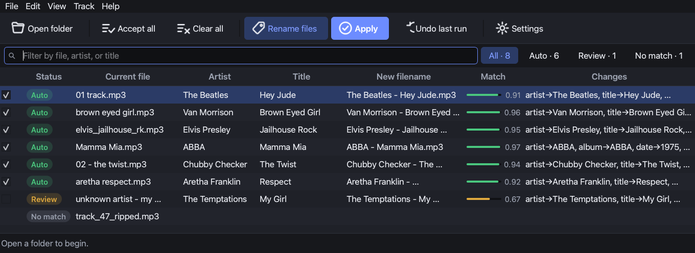TrackTidy identifying a folder of songs with status pills and match confidence